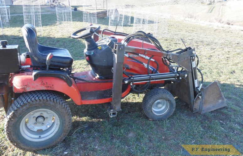 Anthony M., Craig, CO. Simplicity 16HP loader | simplicity garden tractor loader right side bucket at rest
