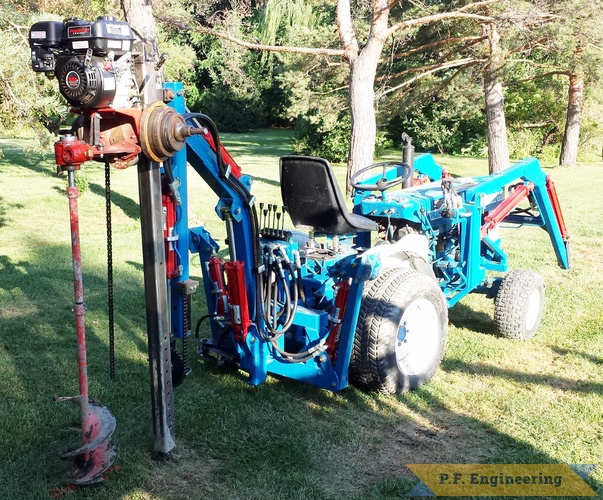 Charlie H., Fraser, MI Ford 1210 micro hoe | Ford 1210 Micro Hoe with post hole attachment by Charlie H., Fraser, MI