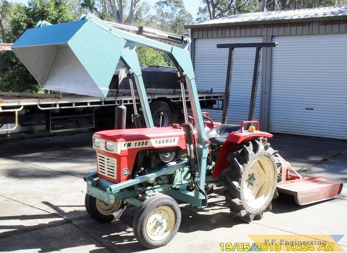 Mike W., Whiteside, Queensland Australia Yanmar 1500 loader | yanmar 1500 compact tractor loader raised bucket dumping