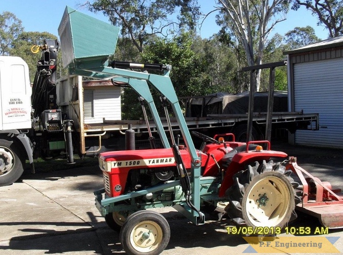 Mike W., Whiteside, Queensland Australia Yanmar 1500 loader | yanmar 1500 compact tractor loader raised curled bucket