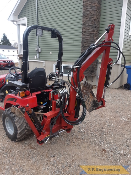 Jean Philippe G. in Allardville, NB Canada and his Mahindra Emax 20s micro hoe | Jean Philippe G. built this Micro Hoe for his Mahindra Emax 20s left rear view