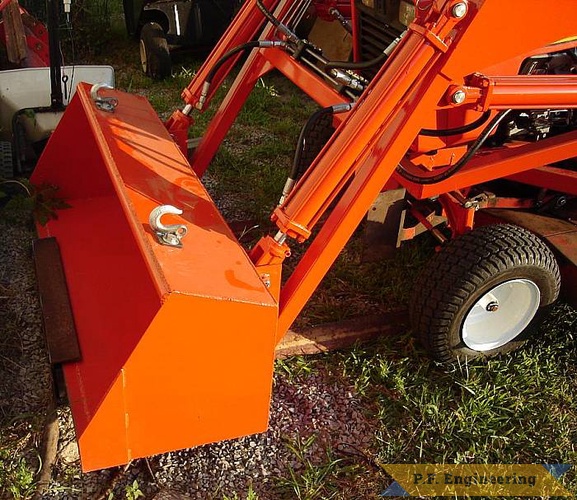 Vince also designed this great storage rack for his loader, just slip the bucket under the lip, unplug from the tractor and back away. | Case Ingersoll 3018 garden tractor loader_1