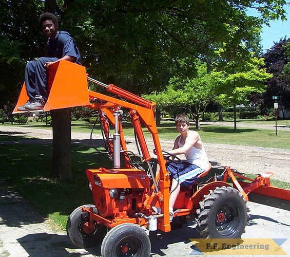 having some fun with the loader! great work Bill and friend! | Economy Power King compact tractor loader_2