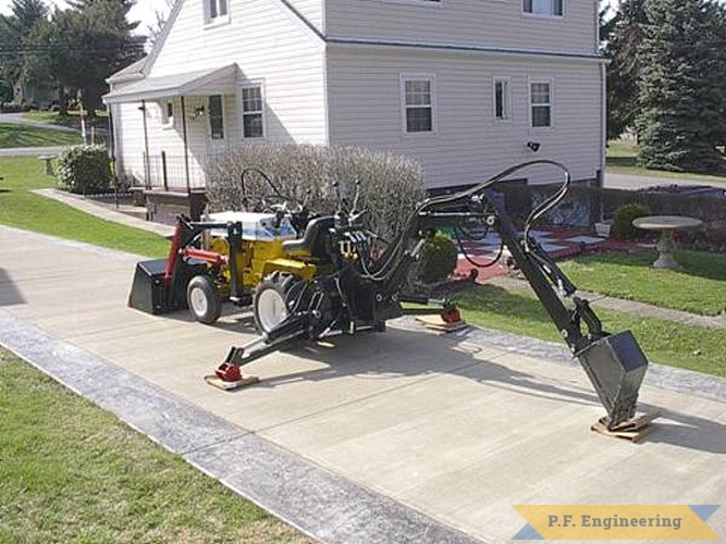 Mark R. from McKees Rocks, PA built this Micro Hoe (and front end loader) for his Cub Cadet 125 garden tractor, nice work Mark! | Cub Cadet 125 garden tractor Micro Hoe_3