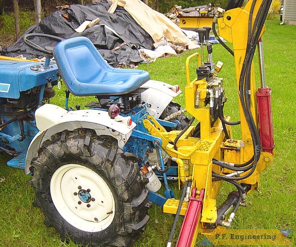 here is the 170 degree boom rotation demonstrated and 3 point hitch mounting. | Ford 1110 compact tractor Micro Hoe_3
