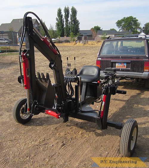 rear view, notice how the stabilizers are at an angle to maximize their effect. | Tow behind Micro Hoe_1