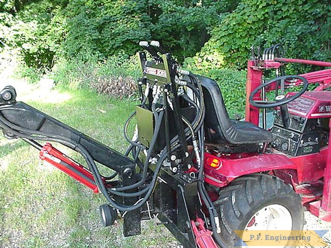 John put the controls on an adjustable mount depending on the seat position. nice detail John! | Wheel Horse 416-8 garden tractor Micro Hoe_2