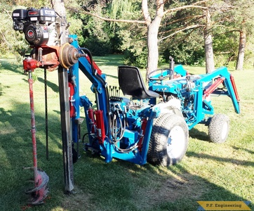 Ford 1210 Micro Hoe with post hole attachment by Charlie H., Fraser, MI