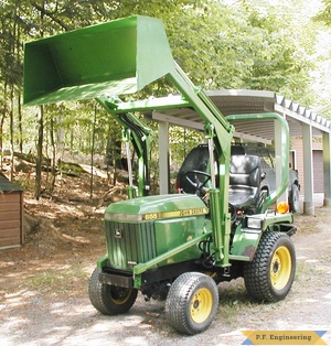 john deere 655 compact tractor loader with bucket raised