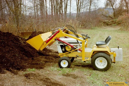 Paul's Cub Cadet 149 with front-end loader attachment.
